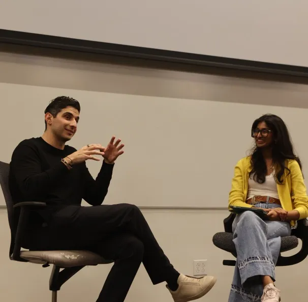 A speaker mid-talk at an IGNITE fireside chat